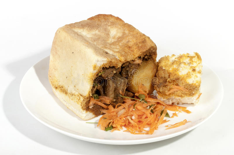 Funky Food from Africa - Flavorful world of bunny chow , a culinary adventure that combines bold spices, aromatic flavors and a unique South African twist.
